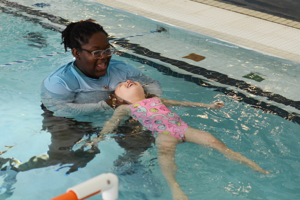 Otter baby and you swim classes at litter otter, parents in the pool with their babies learning swim skills, essential safety skills